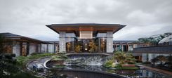 View of the front entrance. To the right is the garage and helipad. 